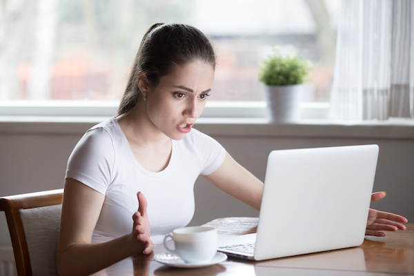 woman stressed because of bad information online